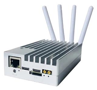 White finned aluminum case with Ethernet, two USB-C ports and four antennas.