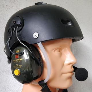 Powered flying helmet with headset.